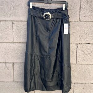 Black faux leather a-line midi skirt.  Elastic waist, zipper, snap & belt.  NWT